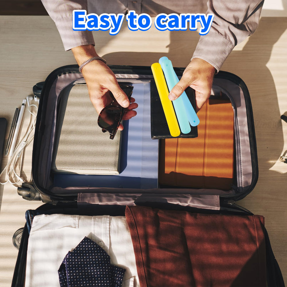 Open travel toothbrush case showing ventilation holes and dual compartments