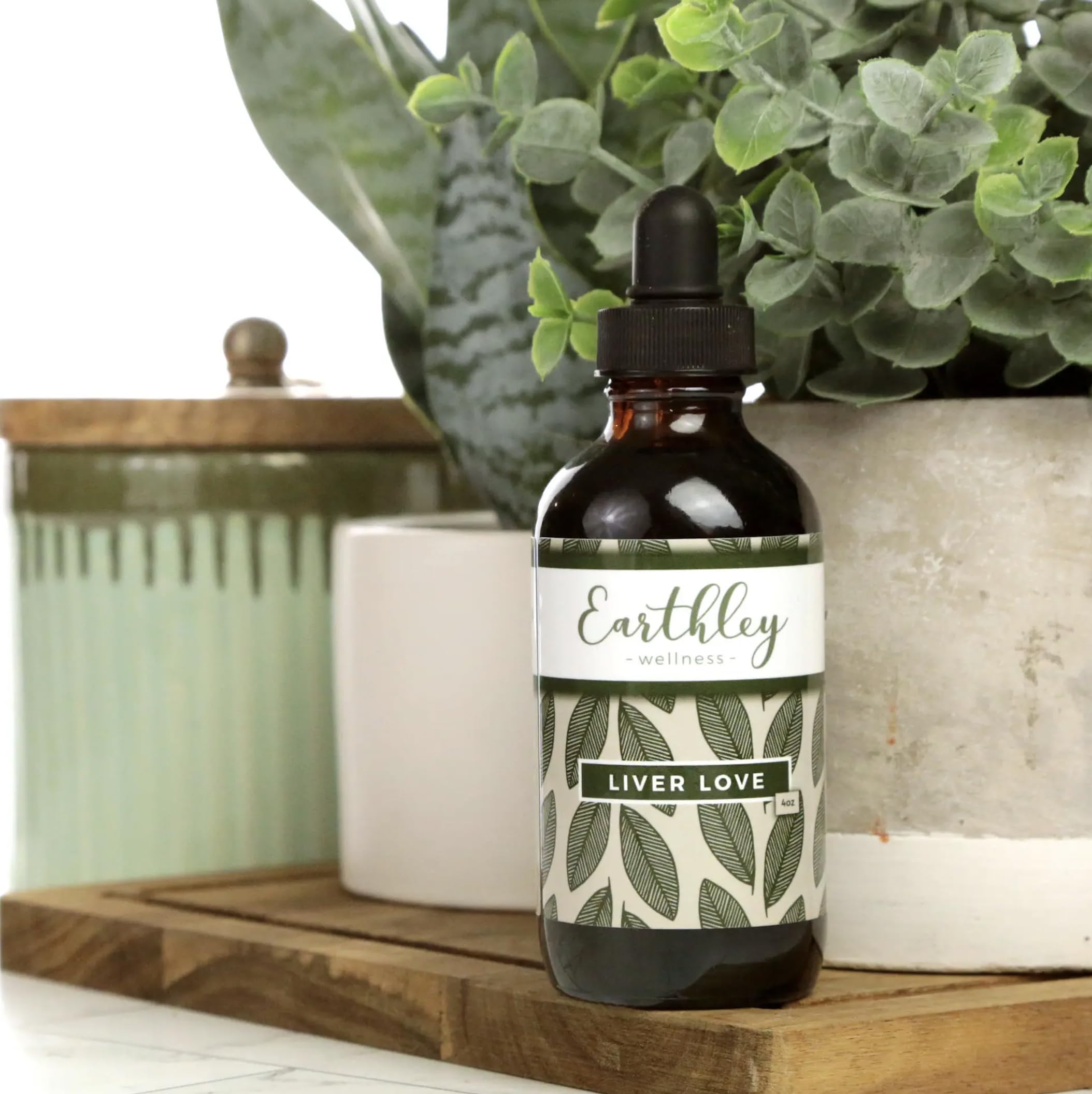 Earthley Wellness Liver Love dispensing spoon suggests easy dosing within daily routines.
