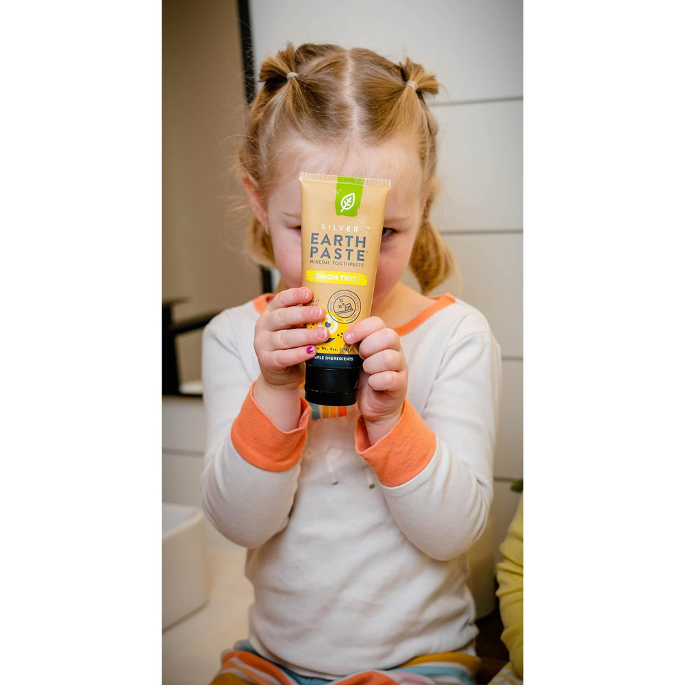 Natural ingredients laid out: bentonite clay, sea salt, essential oils