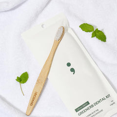 Zero-waste travel dental kit laid out with essential items