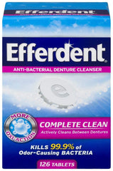 Efferdent Anti-Bacterial Denture Cleanser tablet dissolving in water