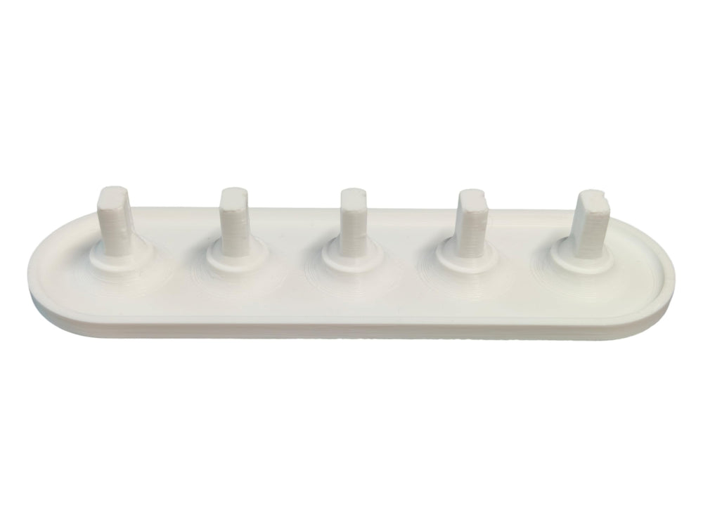 Close-up of durable plastic 3D-printed Oral-B head holder with 2-6 head capacity