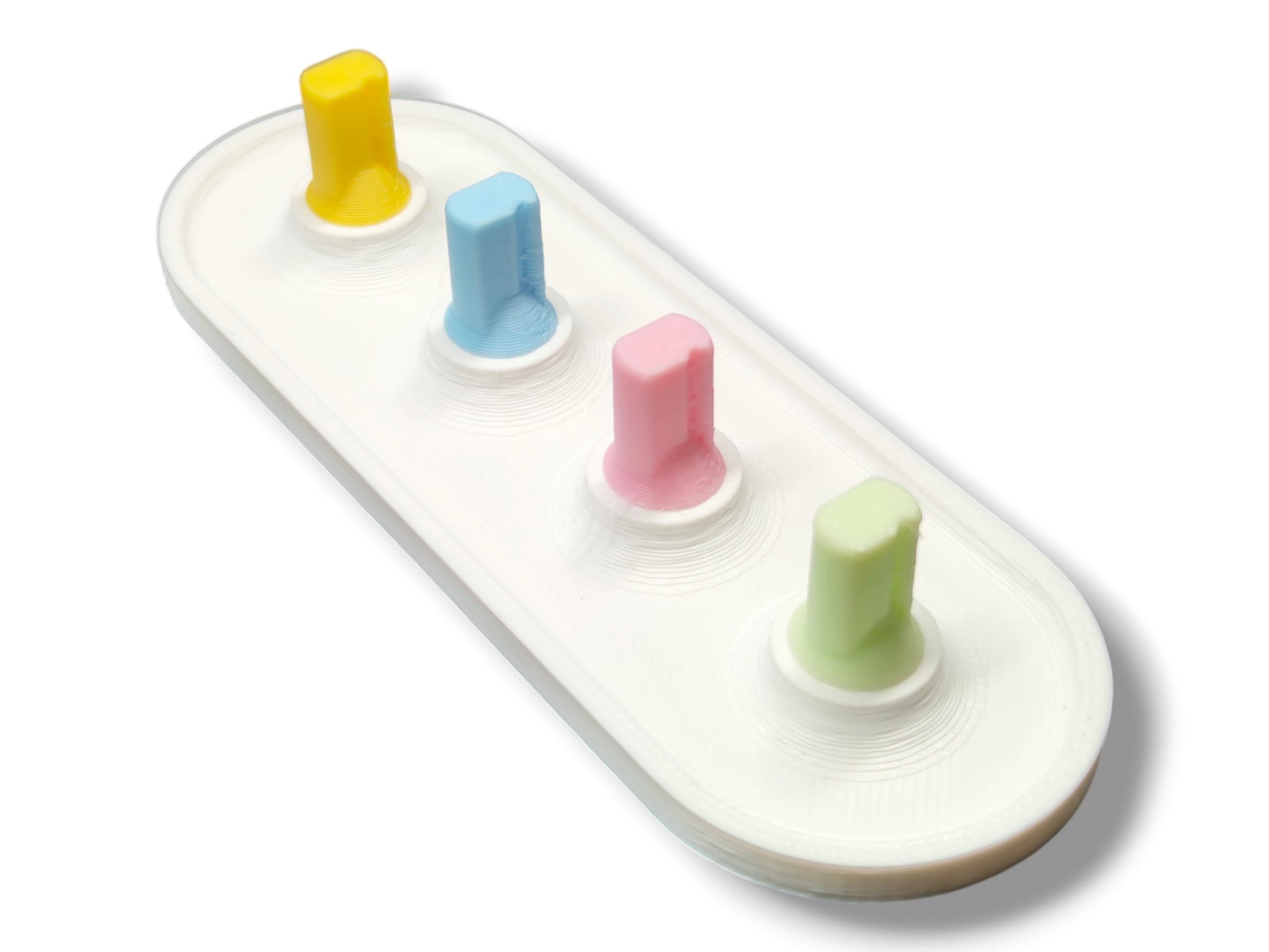 Close-up of the pastel color pegs for quick identification on the Oral-B head holder
