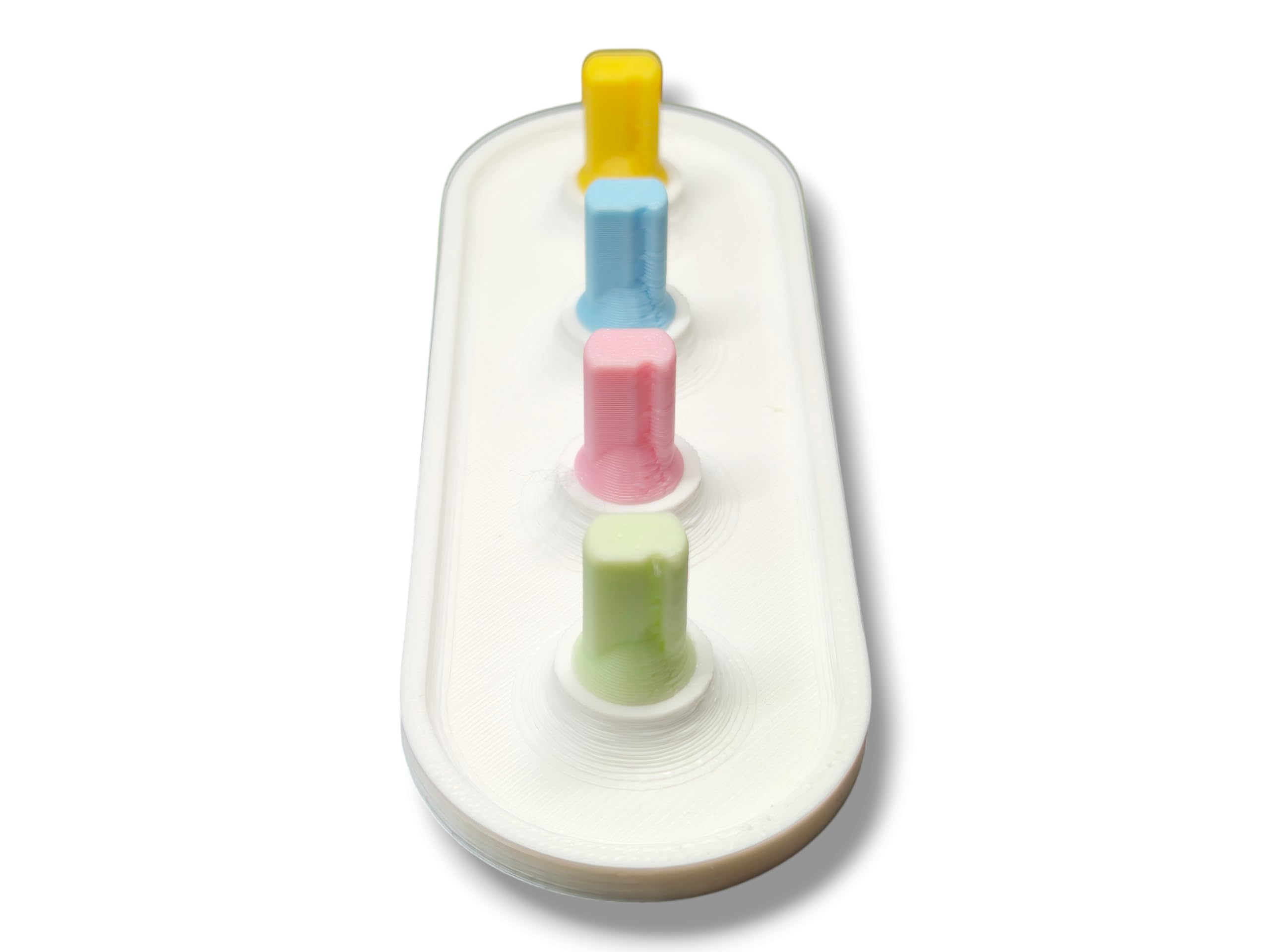 Vertical, space-saving design of Oral-B head holder on bathroom counter