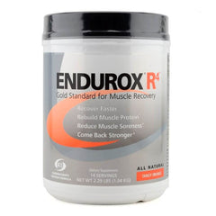 Endurox R4 mixed in a glass with Tangy Orange flavor for tasty recovery