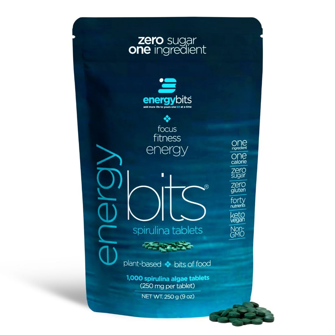 ENERGYBITS spirulina tablets in a bottle and loose tablets