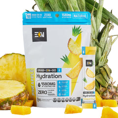 Engineered Nutrition pineapple electrolyte packet close-up for quick sugar-free hydration.