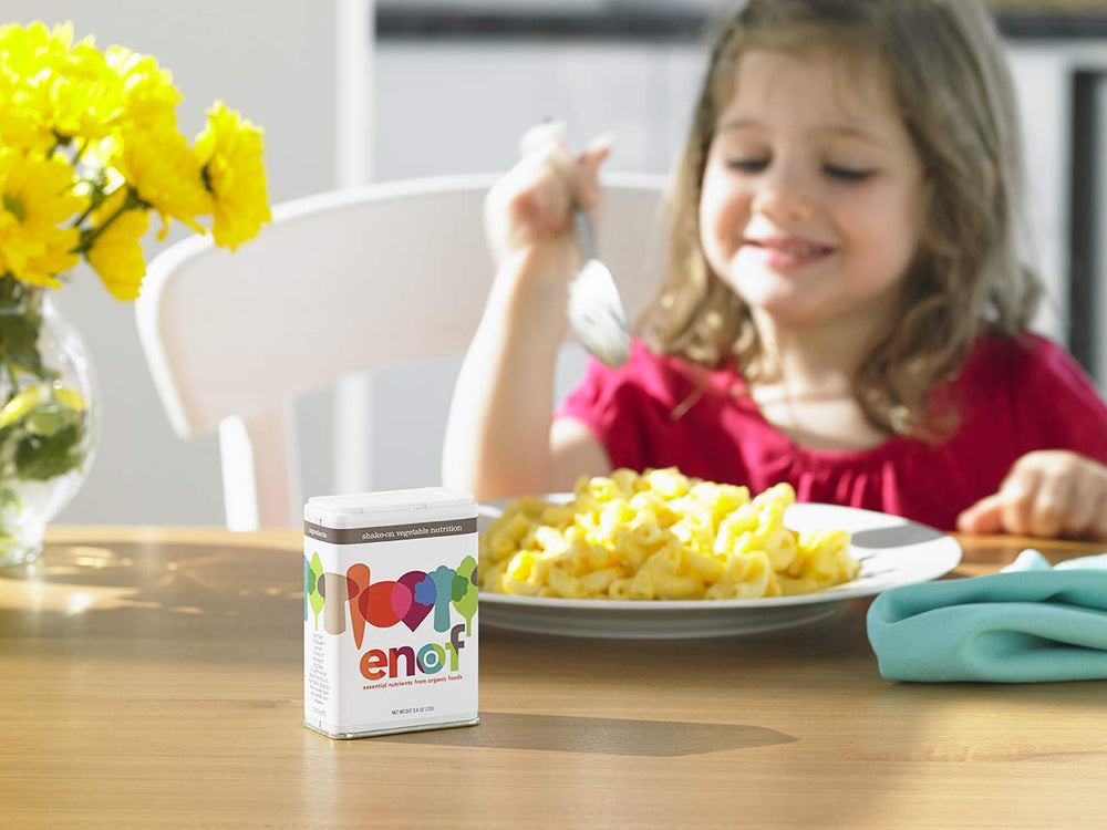 Spoonful of ENOF powder showing fine texture