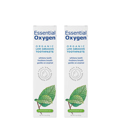 Front view of two 4 oz peppermint Essential Oxygen BR organic toothpaste tubes