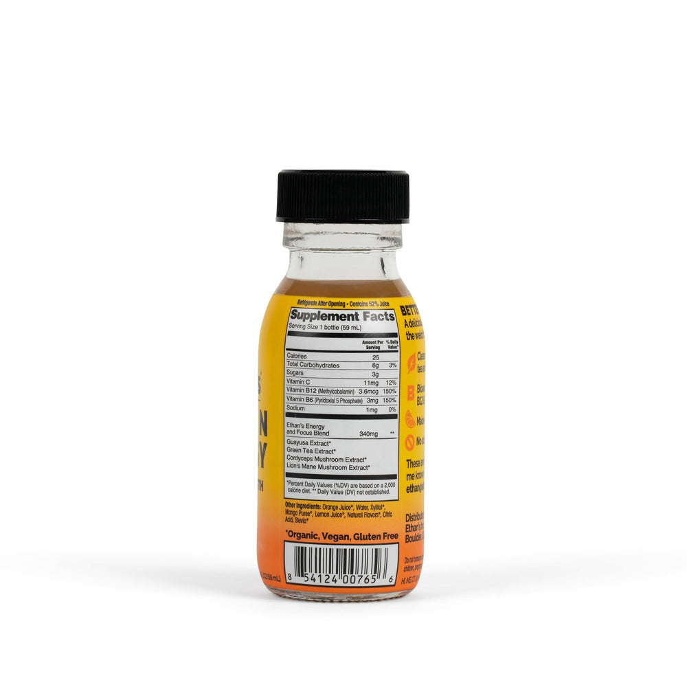Close-up of orange mango flavor label on Ethan's Organic Energy Shots bottle