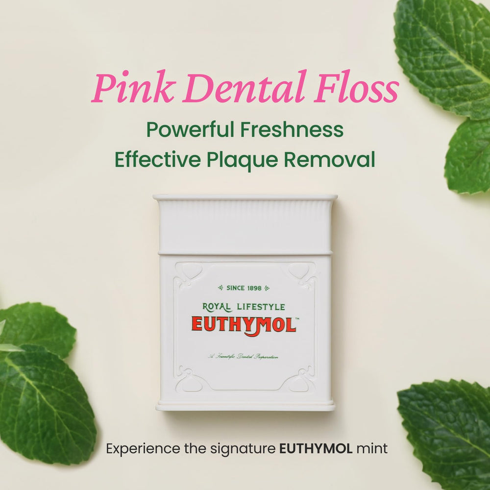 Mint-flavored pink floss close-up with vegan wax coating