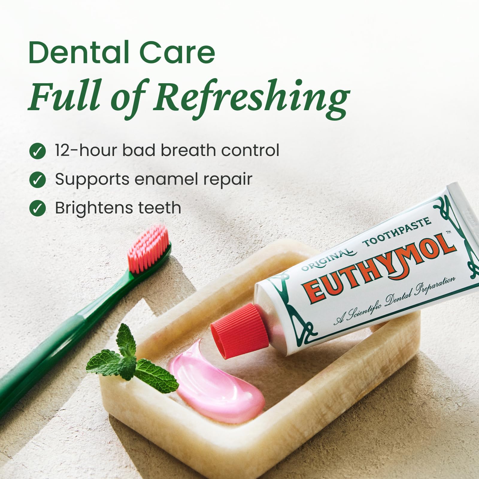 Toothpaste being squeezed onto a toothbrush