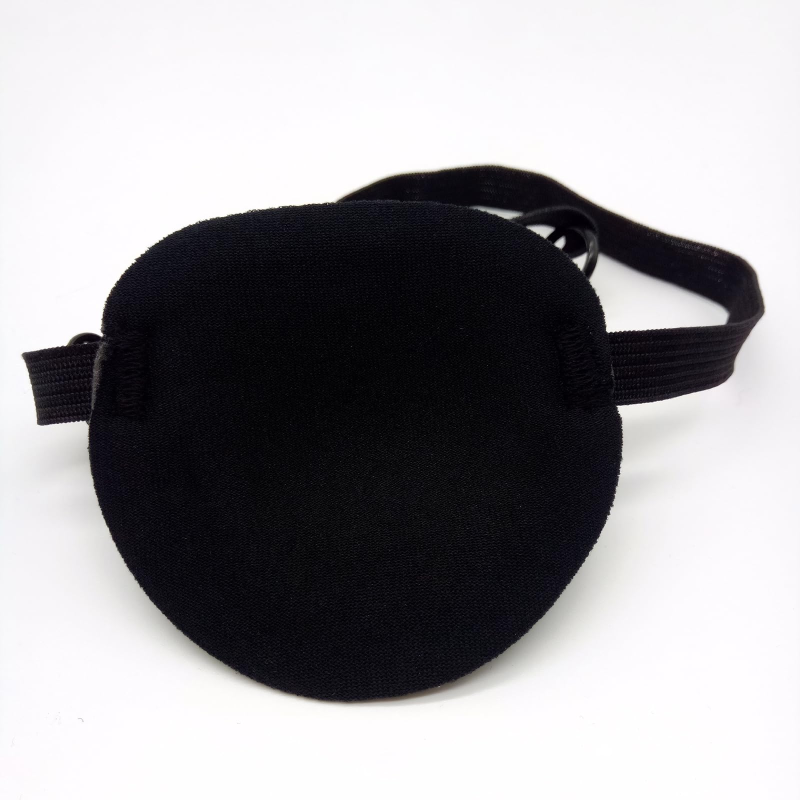 Close up of elastic band and fabric on left eye patch
