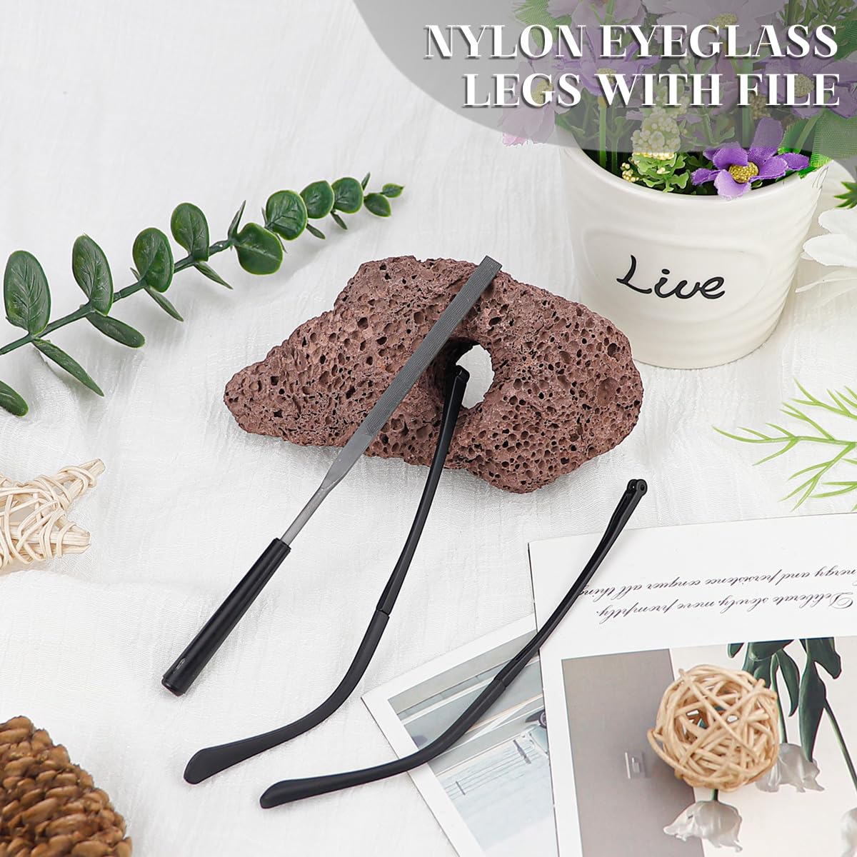 Close-up of replacement arm and small file tool