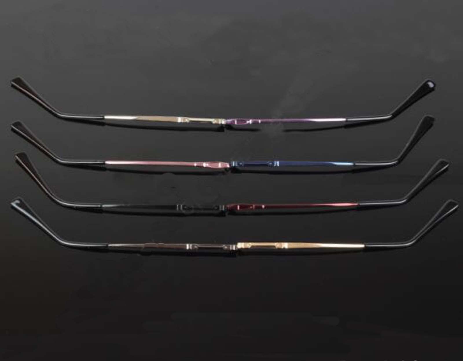 Close-up of black eyeglass replacement arms' tooth and hinge