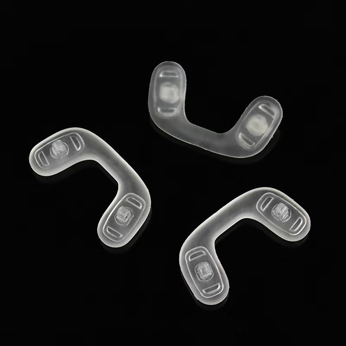 Nose pads mounted on eyeglasses frame