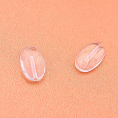 Plastic eyeglass nose pads (11x7mm) - 1 pair, front view