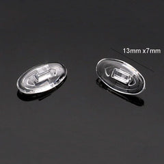 Oval silicone nose pads with hard plastic push-in piece for secure mounting