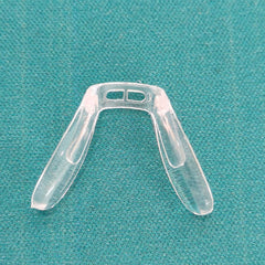 Close-up of silicone saddle bridge nose pad for eyeglasses