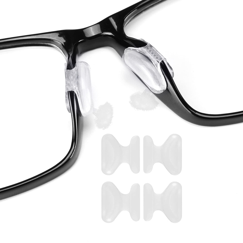 Close-up of clear adhesive silicone eyeglass nose pads, 12 pairs, 1.8mm