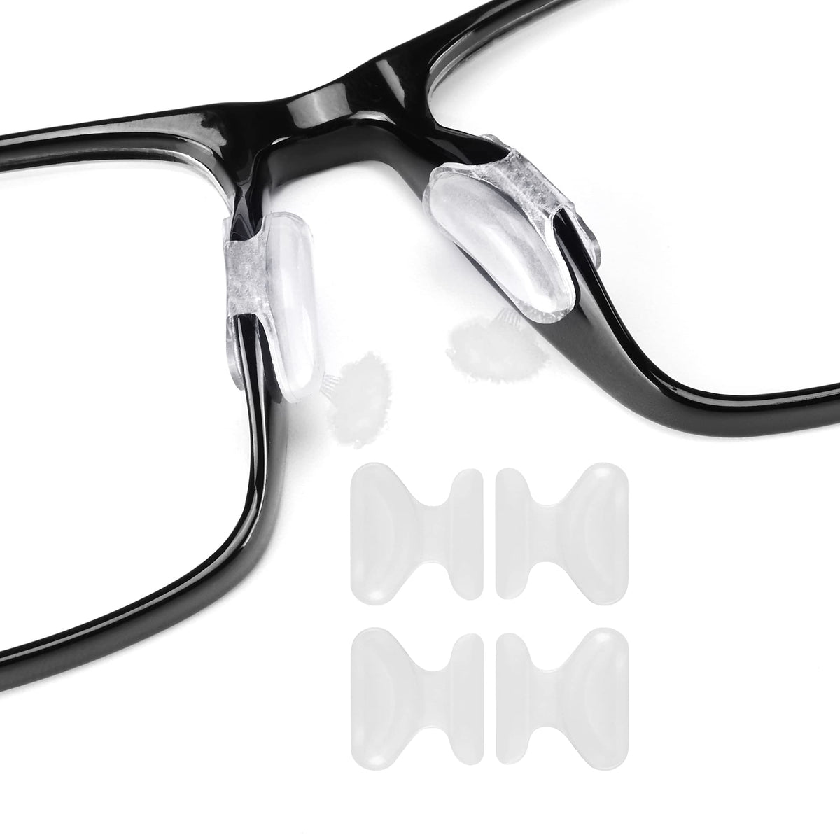 Close-up of clear adhesive silicone eyeglass nose pads, 12 pairs, 1.8mm