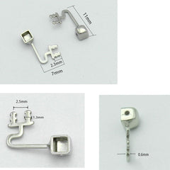 Close-up of stainless steel nose pads and replacement arm