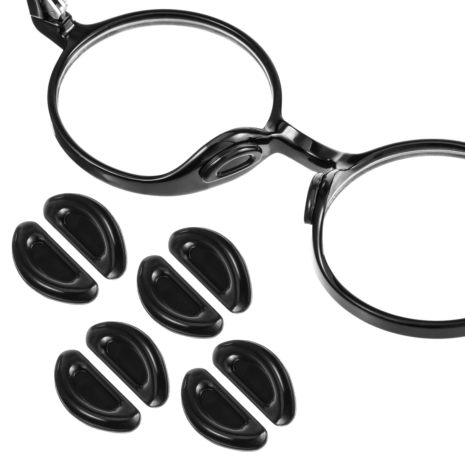 15 pairs of black silicone eyeglass nose pads arranged