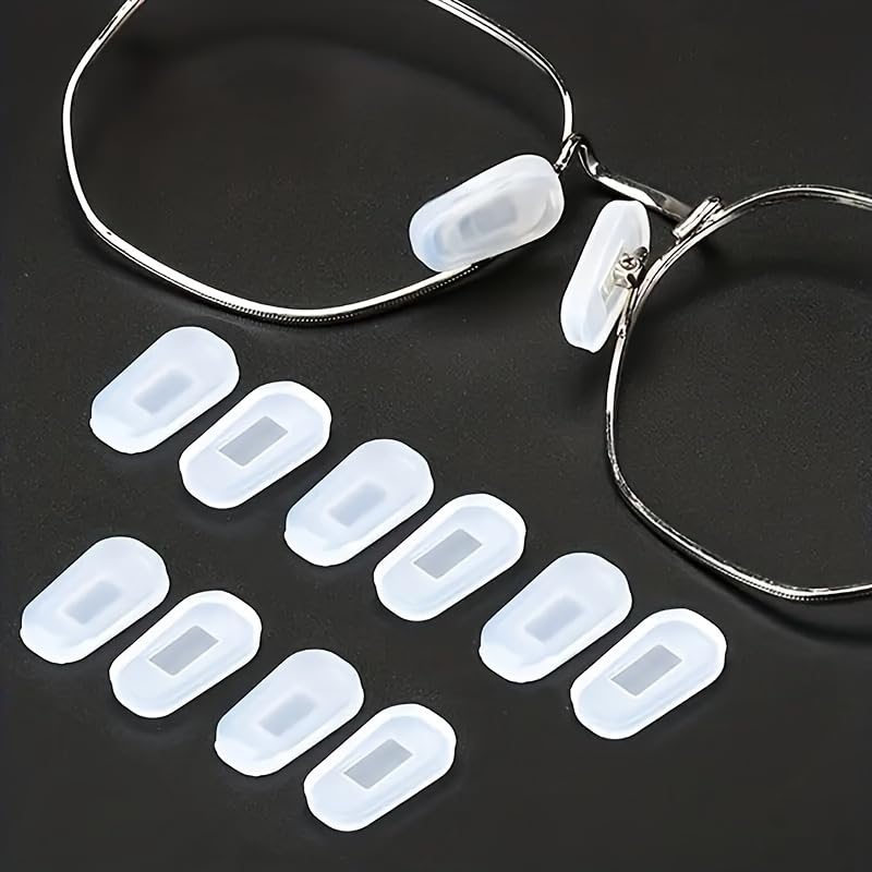 Slip-on nose pad cover attached to eyeglasses