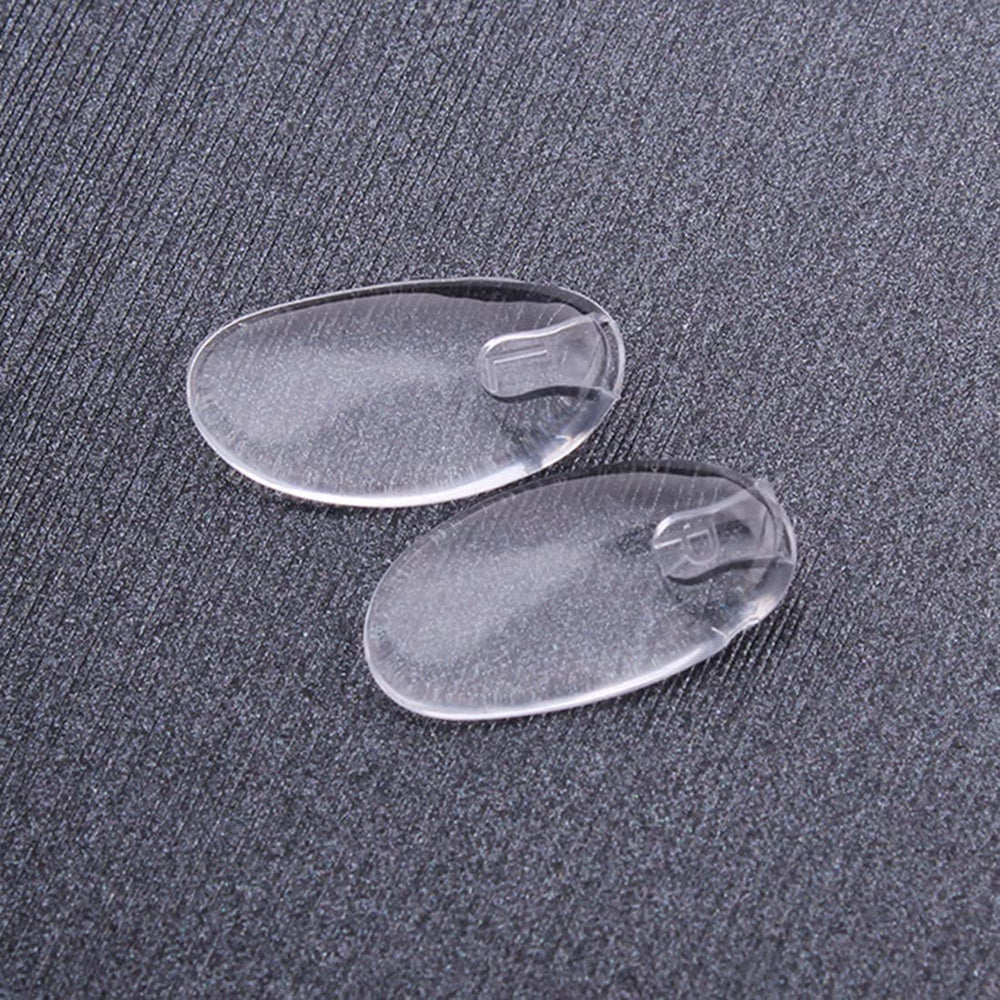 Plug-in eyeglass nose pads in clear silicone