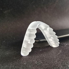 White silicone saddle bridge eyeglass nose pads – front view