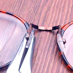 Eyeglass repair tool - pliers for nose pad adjustment