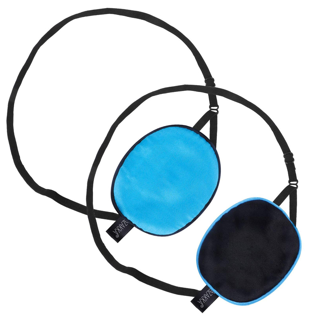 Model wearing blue silk eye patch with elastic strap