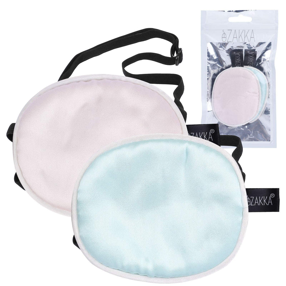 Close-up of pink silk eye patch surface