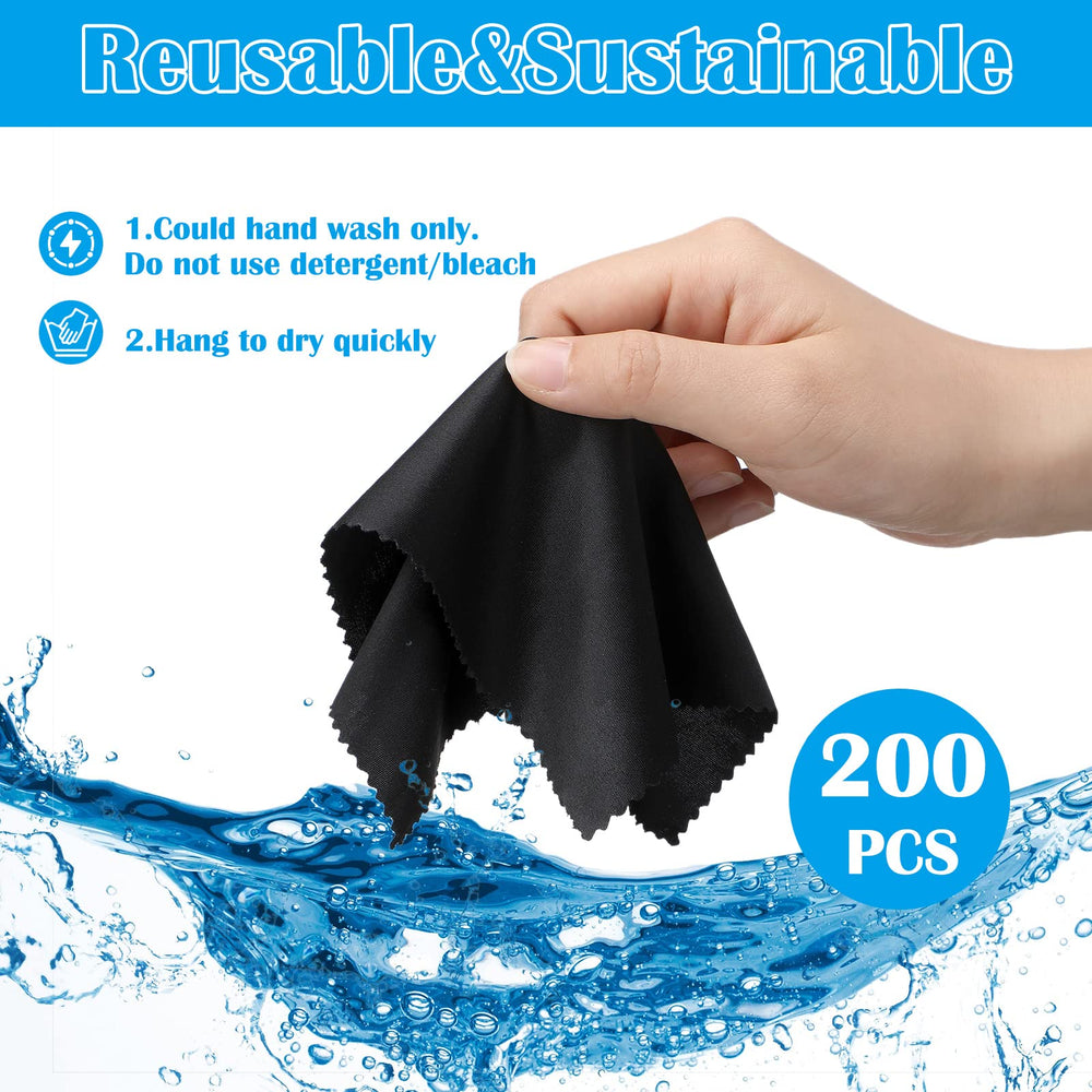 Close-up of microfiber cloths cleaning screens