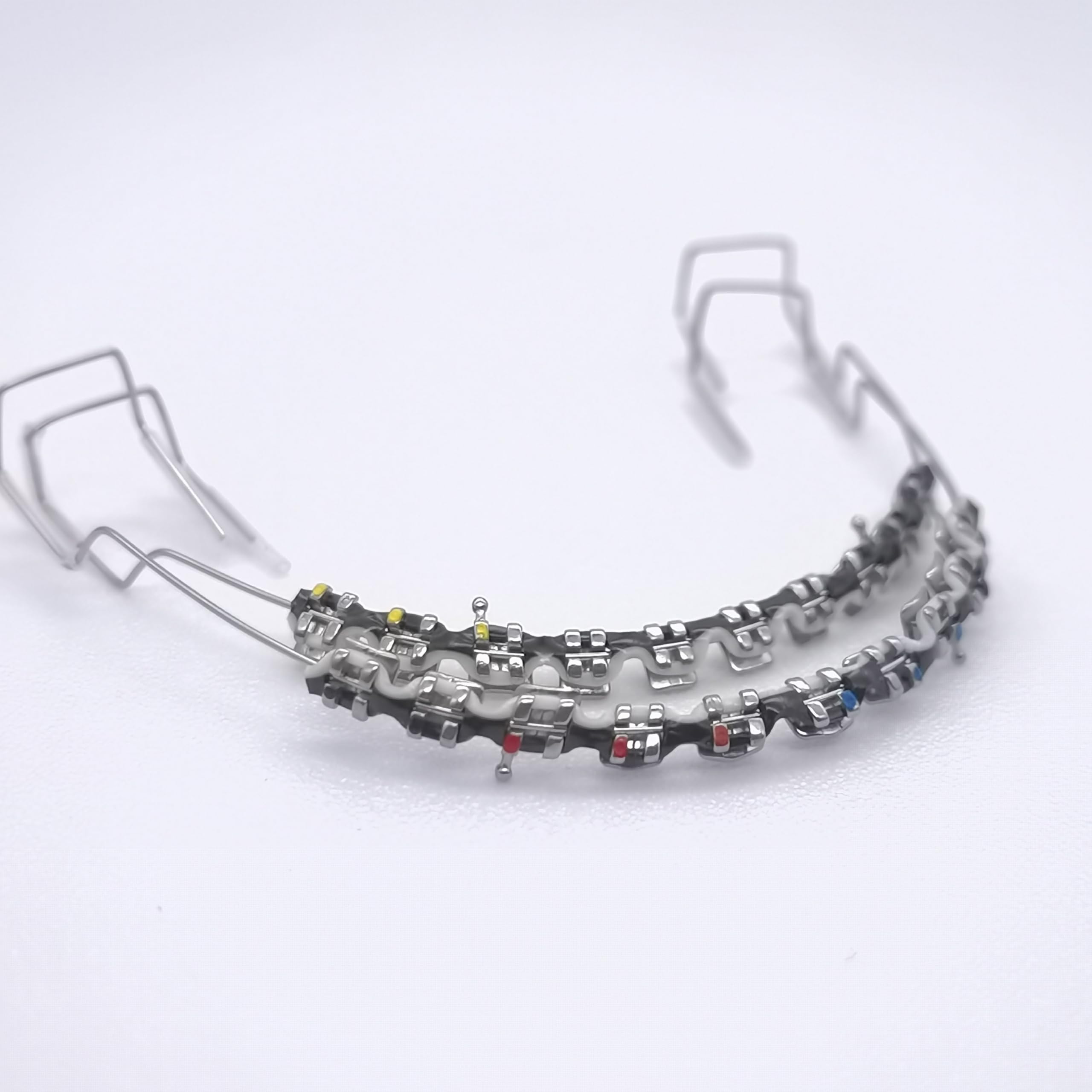 Two-color braces power chains on a teeth model
