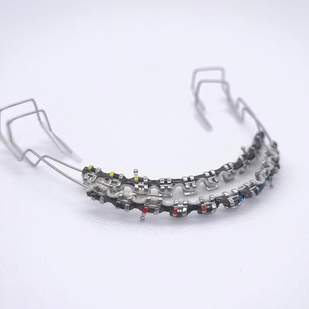 Two-color braces power chains on a teeth model