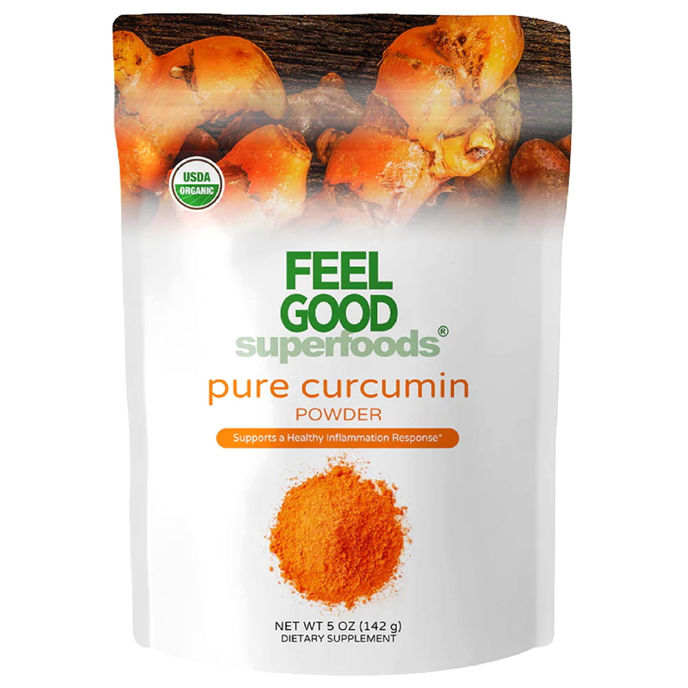 FEEL GOOD Curcumin Powder in a jar with a scoop on a wooden surface