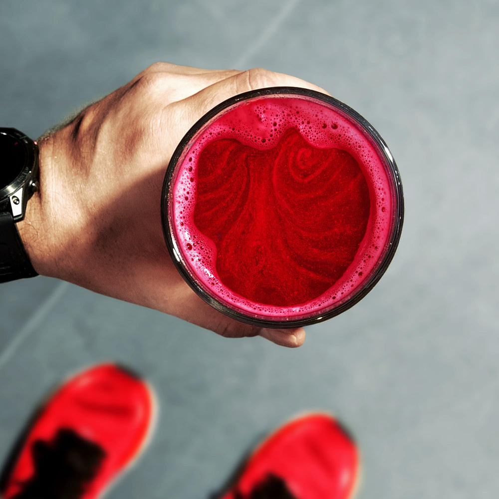 Lemon-infused water prepared with Feel The Beet powder
