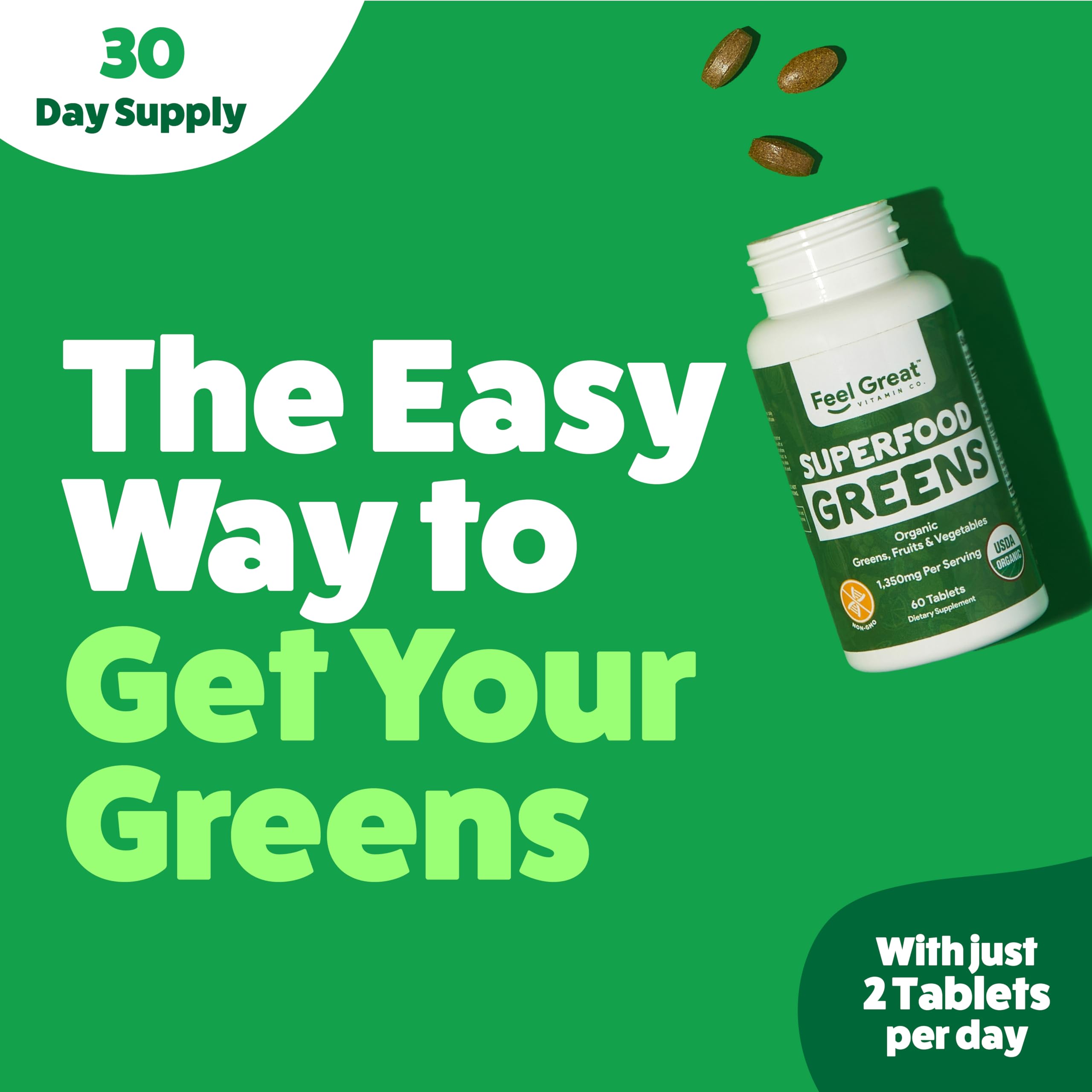 Close-up of green tablets on a white surface