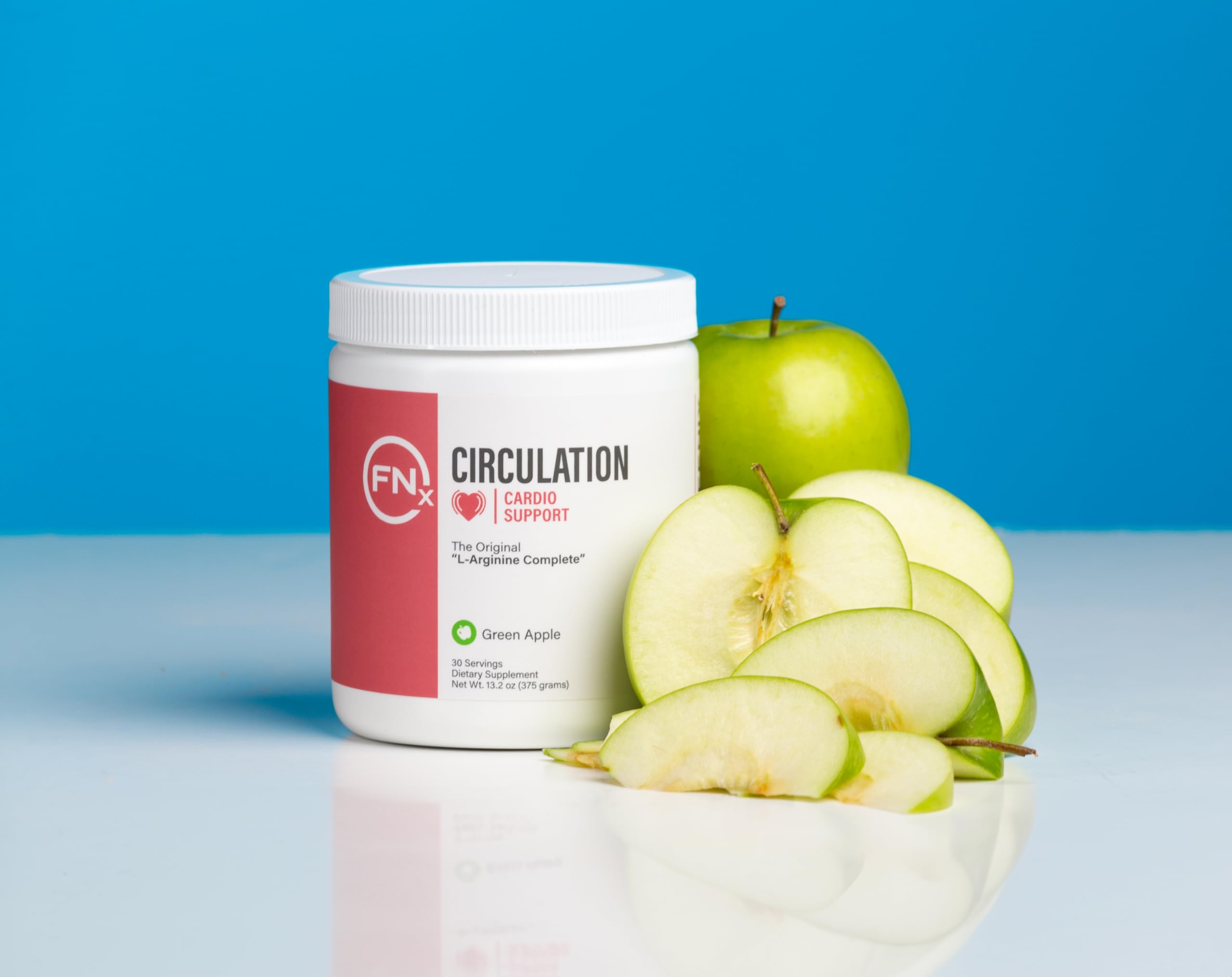 Fenix Nutrition green apple smoothie beside tub for daily routine