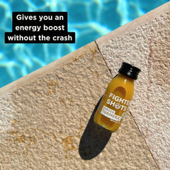 12-pack box of Fighter Shots Ginger + Turmeric