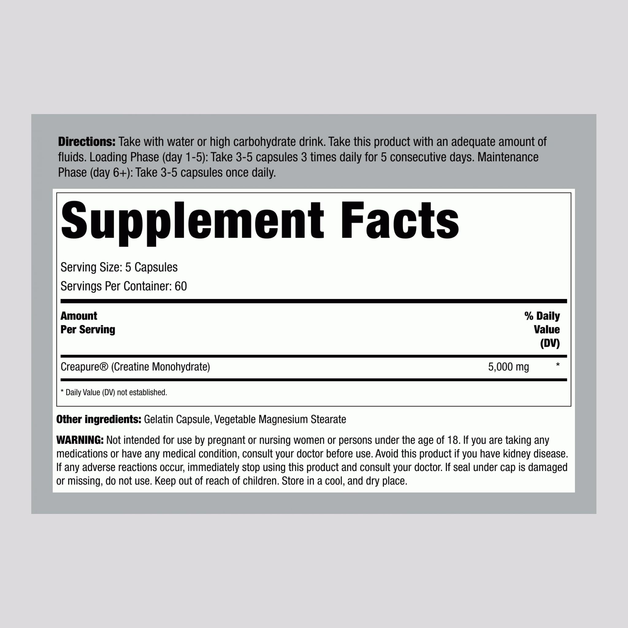 Close-up of Creatine Monohydrate powder in scoop