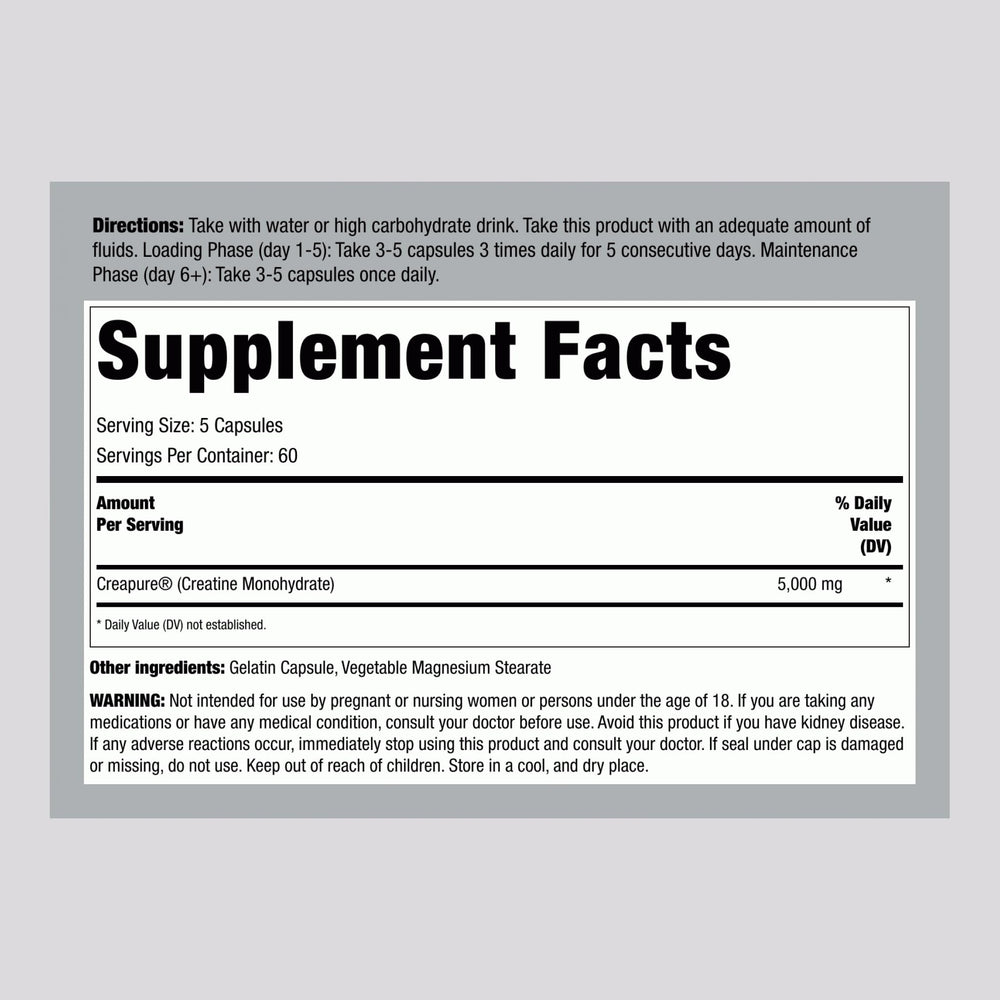 Close-up of Creatine Monohydrate powder in scoop