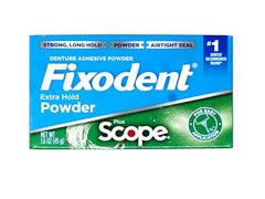 Close-up of Fixodent Extra Strong denture adhesive powder container.