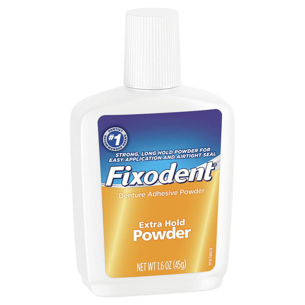 Denture adhesive powder being applied to dentures