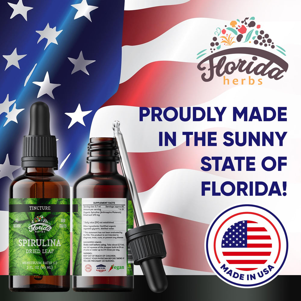Side view of Florida Herbs Spirulina Tincture bottle under light