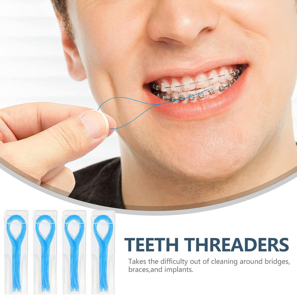 Packaging showing four packs of 100 floss threaders