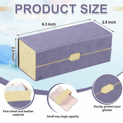 Purple leather travel case open showing dual compartments for lenses and glasses