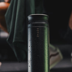 FORME blender shaker bottle leakproof lid demonstrated for secure gym bag transport