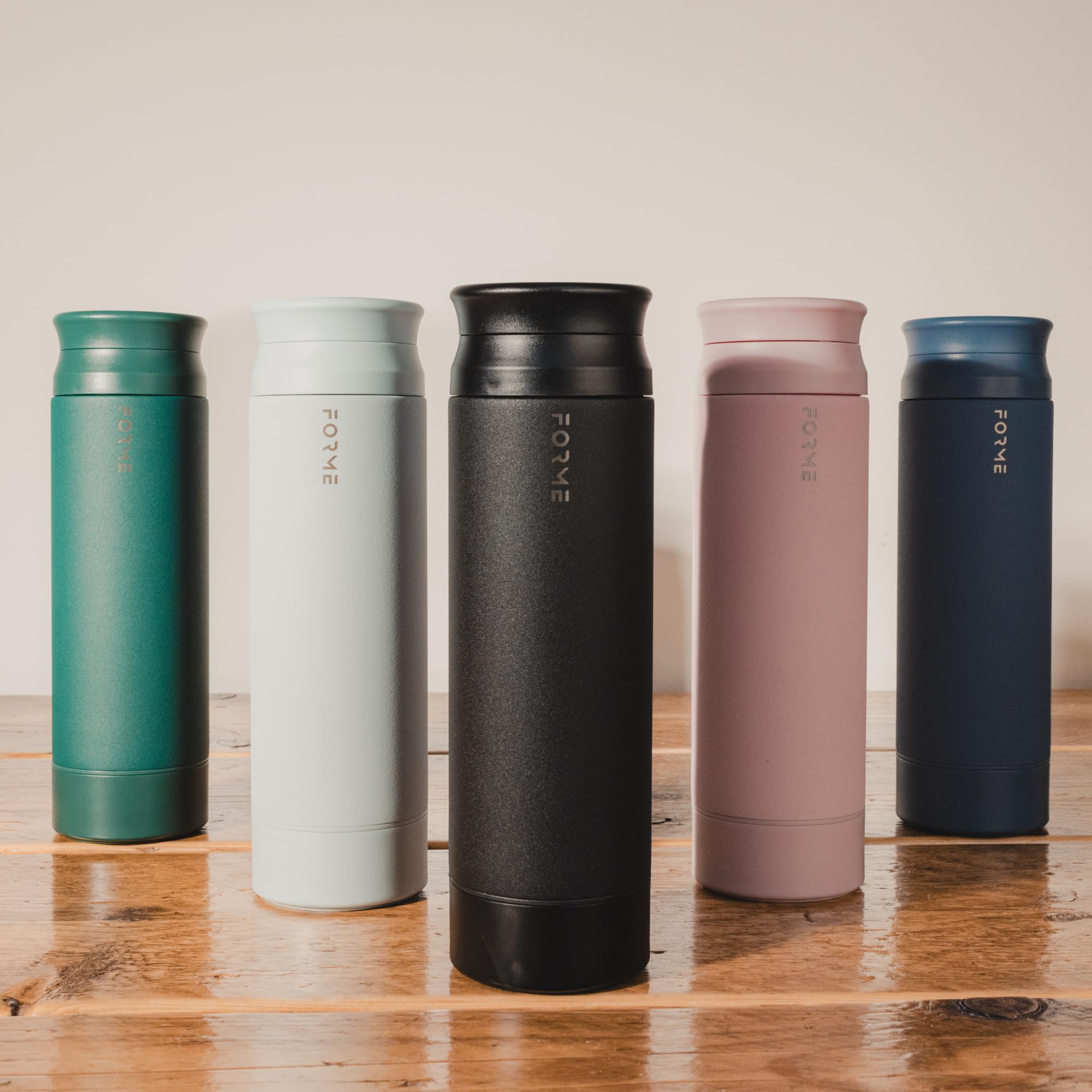 FORME portable gym-bag friendly slate blue bottle for workouts